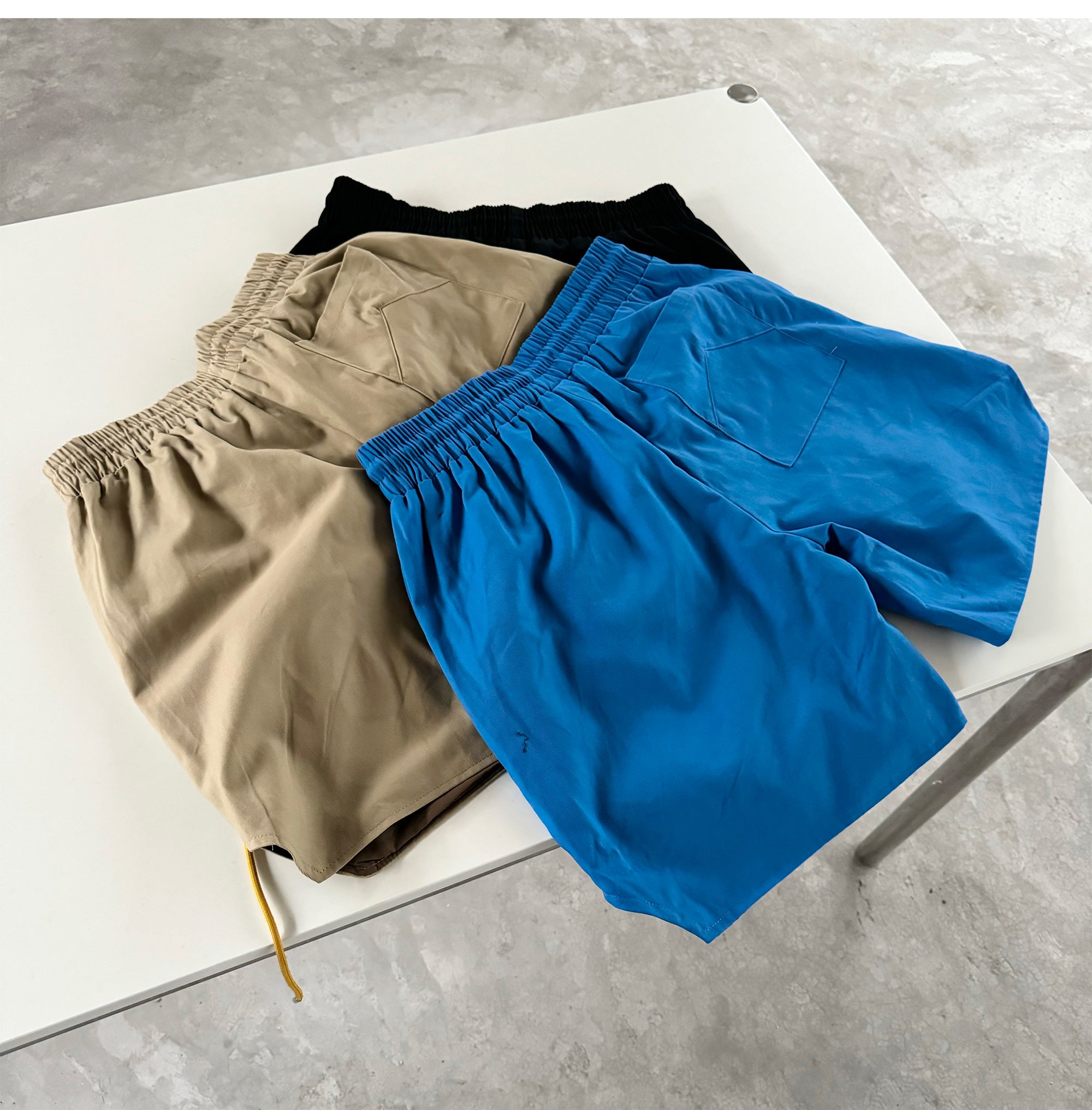RHUDE logo-print drawstring swim Shorts
